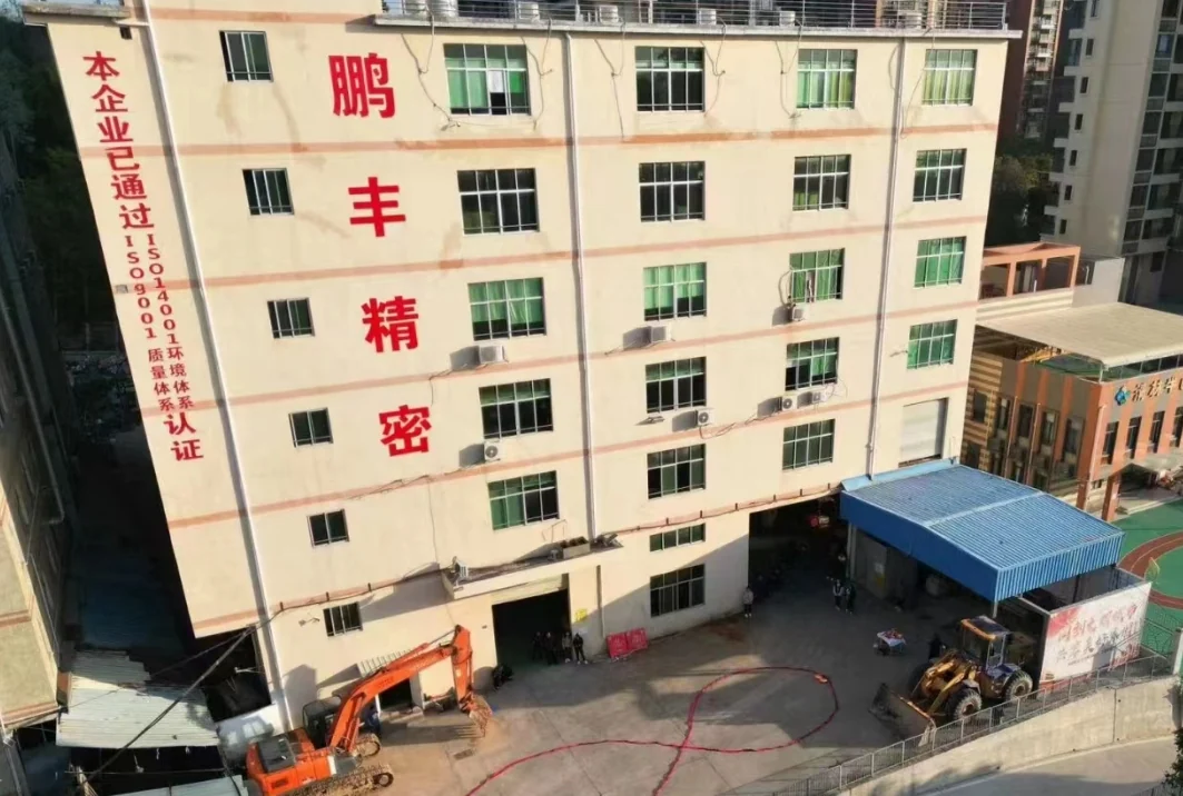 Pengfeng Precision factory building in Shenzhen with the company sign