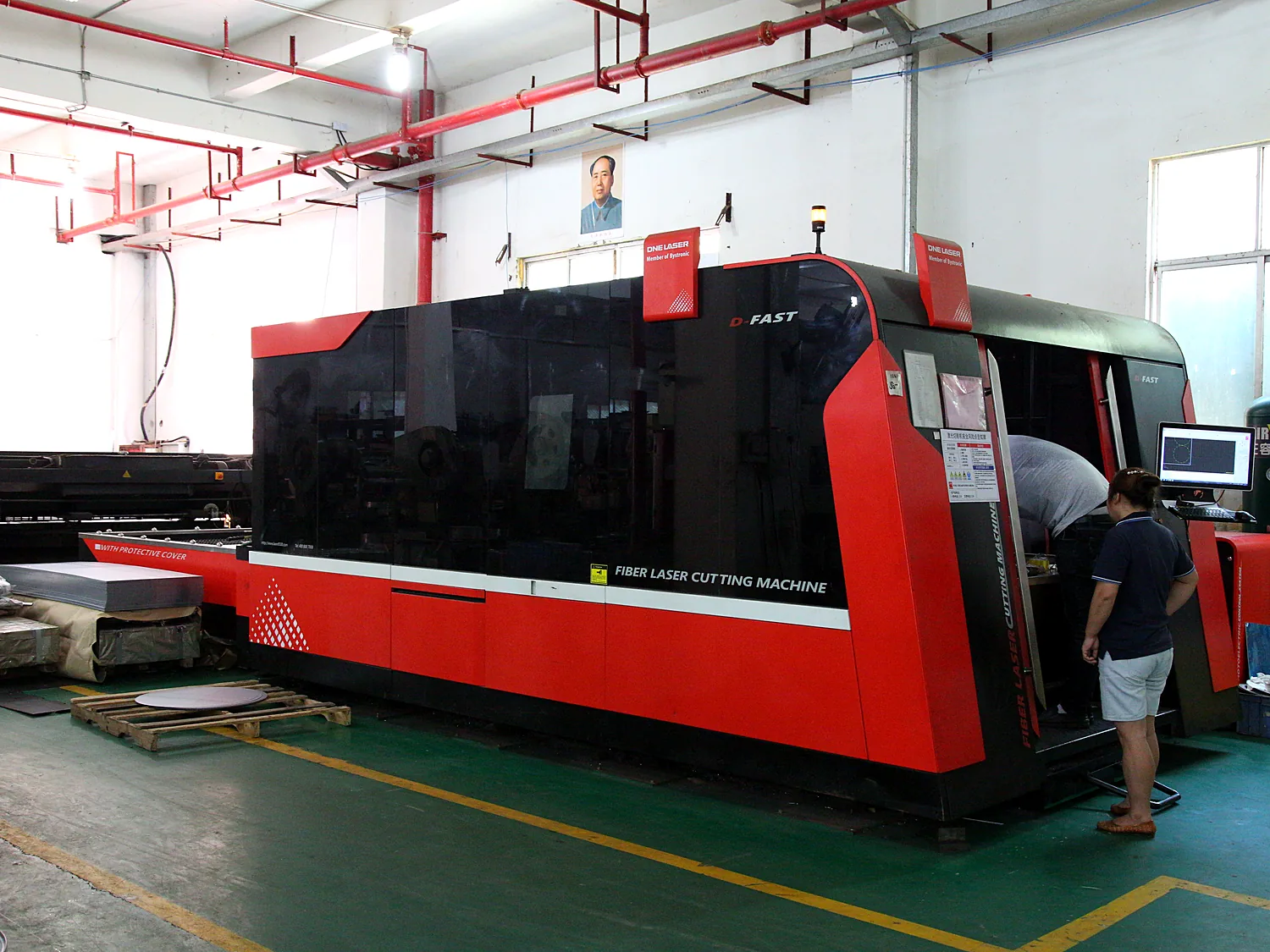 Red CNC machining centre on the shop floor