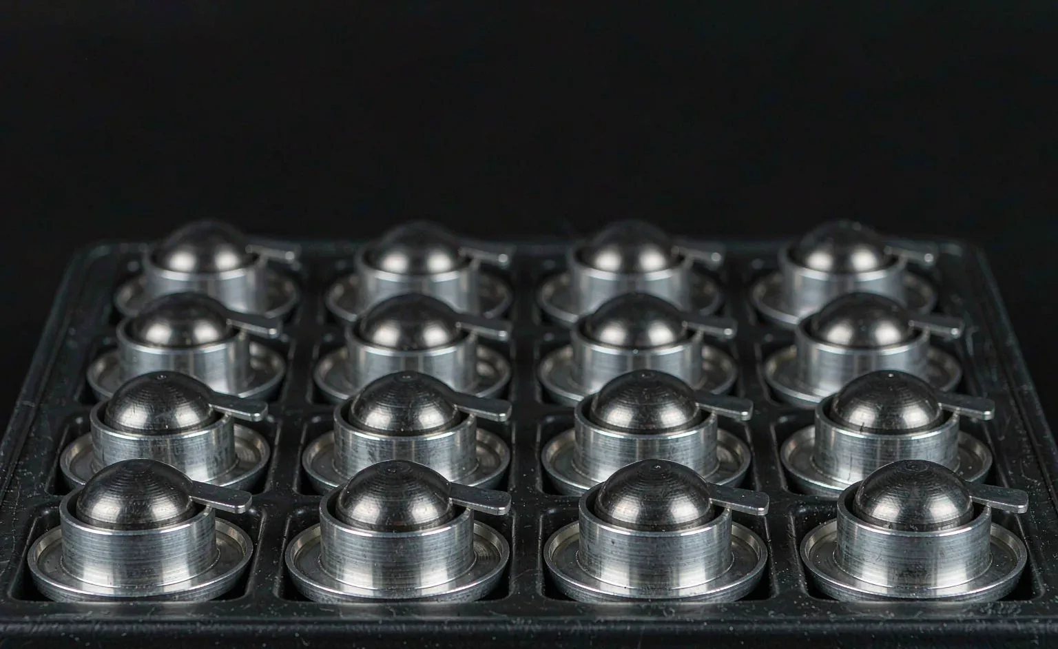 Deep-drawn aluminum enclosures nested in foam trays