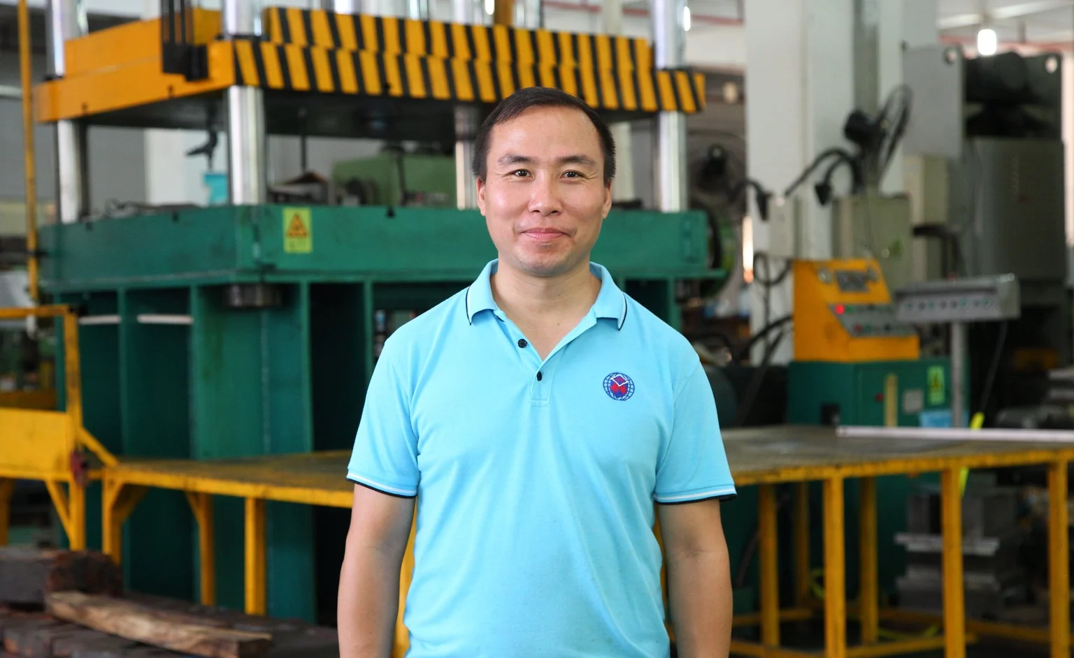 Pengfeng engineer on the stamping shop floor